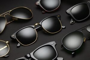 old fashioned sunglasses on black background y6nr4mt